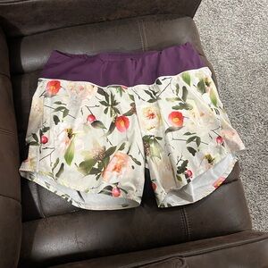 Oiselle Floral Athletic Shorts with Purple Waistband